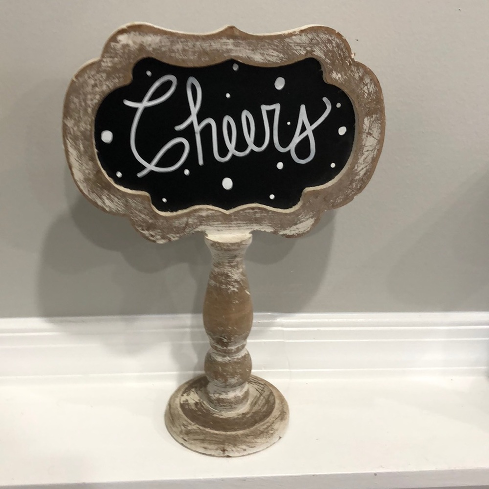 Table top chalkboard with Cheers written on it 🥂